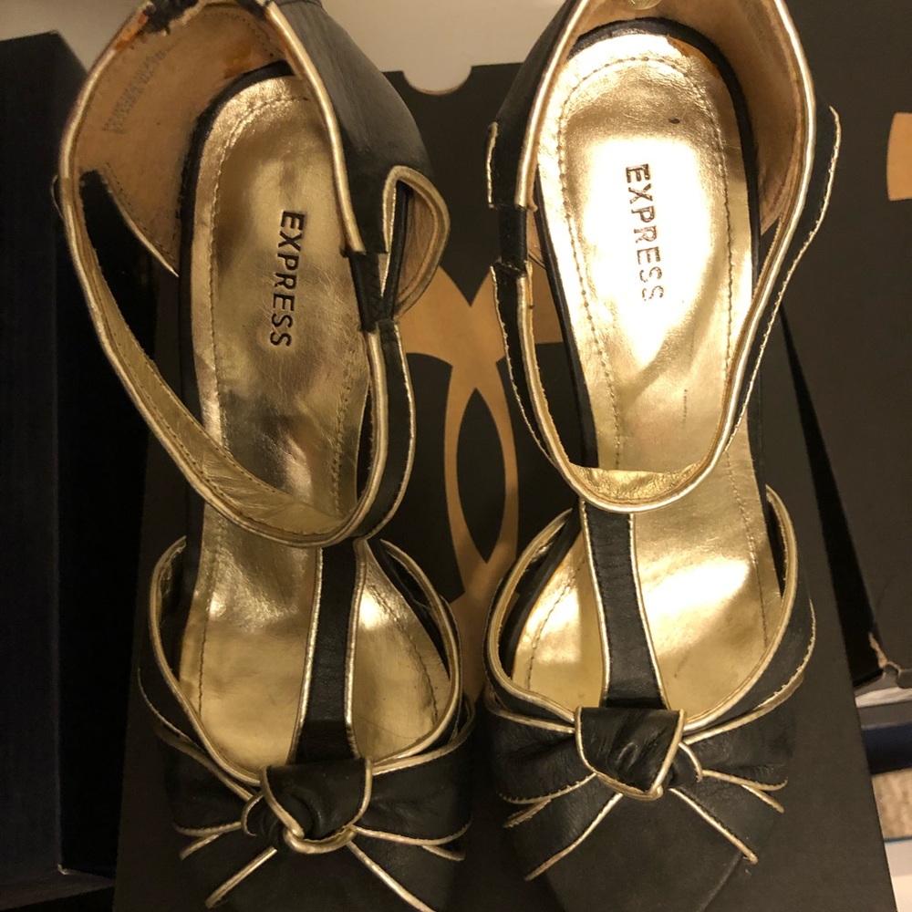Express black and gold heels
